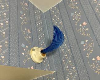 One of many art deco glass curtain / drapery holder