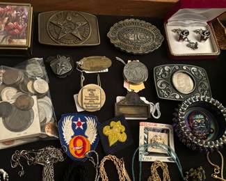 Coins, belt buckles, pins, jewelry