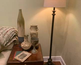 Floor lamp and pottery pieces