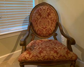 Wooden and upholstered arm chair