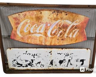 Metal grate with Coca-Cola Fishtail 