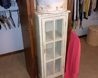 Shabby cabinet with window frame door