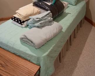 Single or twin bed 
Bed linens 
Frame