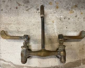 vintage solid brass "lever" handle faucet. Wall mount.