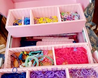 Cade full of rubber band bracelet supplies 