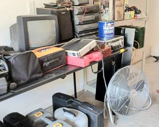 TOOLS.
Saws, drills, nail guns, sanders, and tables full of hand tools.