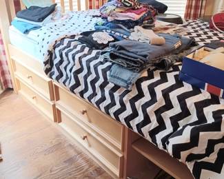 Queen bed with underbed storage drawers. 