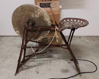 Antique sharpening stool.