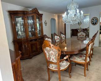 Complete imported Italian dining room set with inlaid custom wood, eight tapestry apolstered chairs, leaf, full lighted glass backed china cabinet and side buffet identical to bottom half of china cabinet. Absolutely beautiful and a great amount of storage. $2500 full set OBO 

We also have some china / glasses available. 