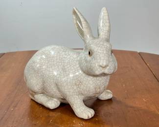 ANTIQUE FRENCH CRACKLE GLAZE CERAMIC RABBIT | Ceramic bunny rabbit covered in a crackle glaze, signed on the bottom. - l. 10 x w. 4-1/2 x h. 7-1/2 in