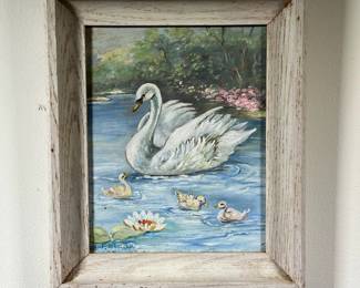 F. WOOLLEY OIL PAINTING | Showing a mother swan, oil on board in a white-washed wooden frame, signed lower left (board 10 x 8 in.) - l. 12.5 x w. 10.5 in