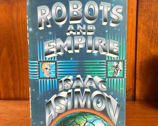 FIRST EDITION: ROBOTS AND EMPIRE BY ISAAC ASIMOV | First edition of Robots and Empire by Isaac Asimov, hardcover with dust jacket. -  l. 6 x h. 8-1/2 in
