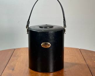VINTAGE LEATHER GEORGE BRIARD ICE BUCKET | Leather-covered ice bucket with lid and bail handle. - l. 9 x w. 8 x h. 9 in