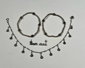 STERLING SILVER PENNY WEIGHTS JEWELRY | Including 2 bracelets, a pair of earrings, and a seashell and bell ankle bracelet
