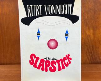 FIRST DELACORTE PRINTING OF SLAPSTICK BY KURT VONNEGUT | Hardcover book with dusk jacket. - l. 6 x h. 8-1/2 in
