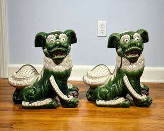 (2PC) PAIR FOO DOG STATUES | Green and white glazed ceramic foo dog statues. - l. 16 x w. 11 x h. 18 in