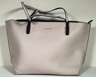 CALVIN KLEIN PURSE | Light pink leather Calvin Klien purse with black leather interior. -  l. 17.5 x w. 5 x h. 11 in