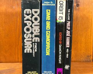 (4PC) SCIENCE FICTION BOOKS | Including The Classic Philip by Jose Farmer 1952–1964, Orbit 15 by Damon Knight, Time and Tomorrow by John D. MacDonald, and Double Exposure by Piers Anthony. -  l. 6 x w. 8-1/2 x h. 2 in
