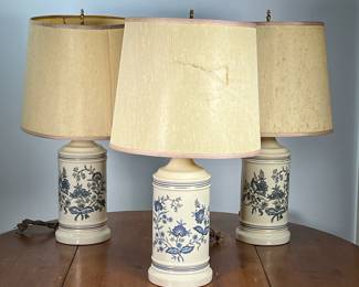 (3PC) FLORAL CROCK-FORM LAMPS | Ceramic crock-form lamps having blue floral design with gilt rims. - h. 24 x dia. 5.5 in