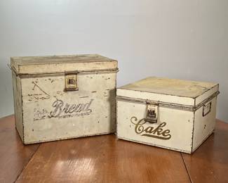 PAIR KREAMER BAKED GOOD TIN BOXES | One labeled "bread", the other labeled "cake", with hinged lids and each marked "KREAMER" on the bottom. - l. 15 x w. 10 x h. 10-1/2 in