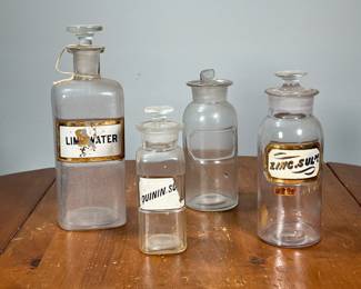 (4PC) RECESSED LABEL APOTHECARY JARS | Glass apothecary jars, three with labels. -  h. 10 in (tallest)
