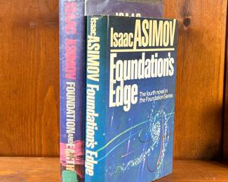 (2PC) FIRST EDITIONS OF ISAAC ASIMOV’S FOUNDATION NOVELS | Including "Foundation and Earth" and "Foundations Edge", both part of the foundation Series. - l. 6-1/2 x h. 9-1/2 in
 