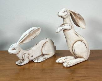 PAIR WOOD CARVED & PAINTED RABBITS | Wood carved and white painted decorative bunny rabbits. - l. 8-1/2 x w. 3 x h. 7-1/2 in

