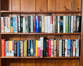 LOT OF BOOKS | Two shelves full of books. Genre varies between history fiction science sports fantasy, etc., mostly hardcovers.