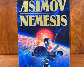 FIRST EDITION OF NEMESIS BY ISAAC ASIMOV | First edition science fiction novel by Isaac Asimov, hardcover book with dust jacket. - l. 6-1/2 x h. 9-1/2 in
