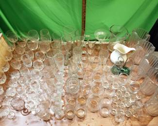 Over 100 piece Barware: Crystal, Quality Glass, Lexan/Ceramic/Glass Pitchers.
All wrapped in Napkins, boxed & ready to travel. Sell as Full Set