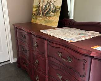 This dresser has matching nightstands and a bench. All sold separately.