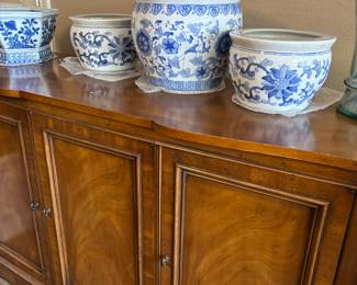 Mid Century Buffet needs a little work at the base. Blue and White planters never goes out of style!
