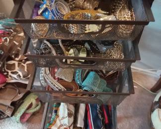 Lots of ladies accessories including scarfs, belts, jewelry and more