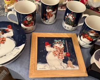 Set of cups, plates, coasters and trivet. 
