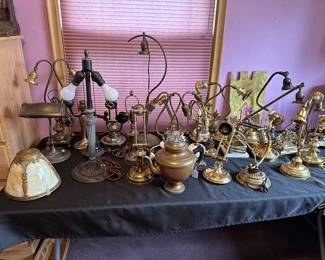 Brass lamp stands, copper teapot