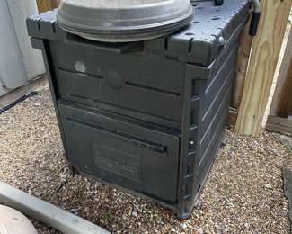 Compost box with turning tool.