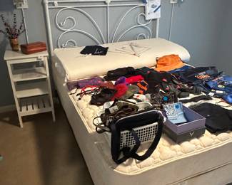 Iron bedframe with queen mattress and boxspring