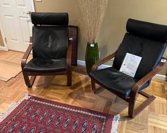 IKEA Poang black leather chairs