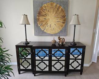 Three piece console table with mirrored doors. Large gorgeous sand dollar painting.