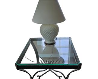 Wrought iron end table with glass top. One of a pair and has matching coffee table
