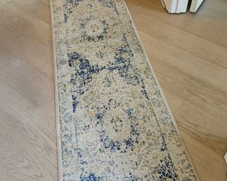 Thirteen foot hall, runner in blues and cream colors