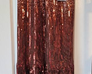 Fabulous copper colored sequin and fringed skirt. New with tags