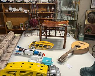 Thompson Mandoloncello Standard C, Egyptian Revival Stool, and toy collection