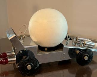 Vintage Racing Car Hanging Light Fixture 

Fun and unique design! In overall good vintage condition with some light wear

The car measures about 18" l x 9.5" h 