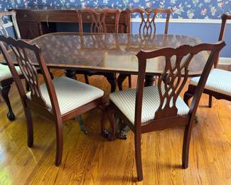 Vintage Dining Room Table and Chairs Set 

Beautiful traditional style featuring elegant chairs and brass claw feet. The table measures 46" x 68" x 29.5" and comes with a 24" leaf