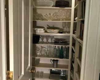 Explore the entertaining treasures in the walk in pantry: serving pieces, small appliances, some new in box 