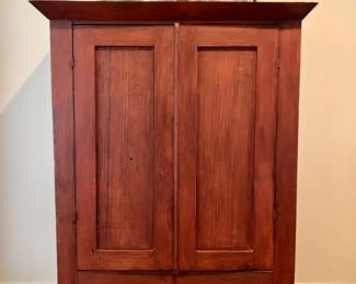 Louisiana Cypress Child's Armoire, 19th Century, hand split cypress back, later Gros Rouge surface. 57 inches high by 43 inches wide by 18 inches deep