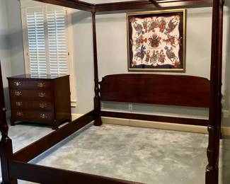 Vintage solid mahogany four poster King Sized Bed with Chippendale chinoiserie fretwork detail around canopy in excellent condition. 80" tall.