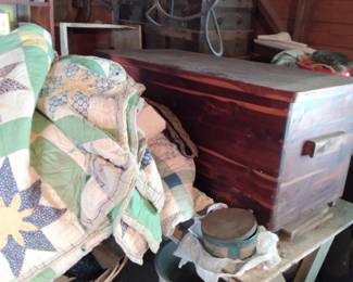 Handmade quilts metal buckets baskets cedar chest