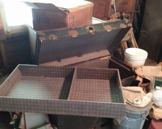 Old trunks and sink paint cans